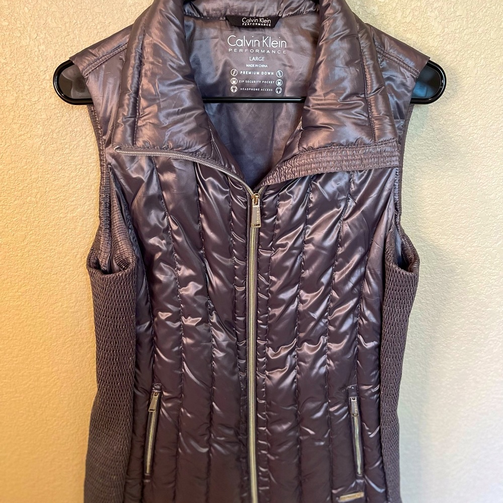 Calvin Klein Performance sweater vest with headphone access